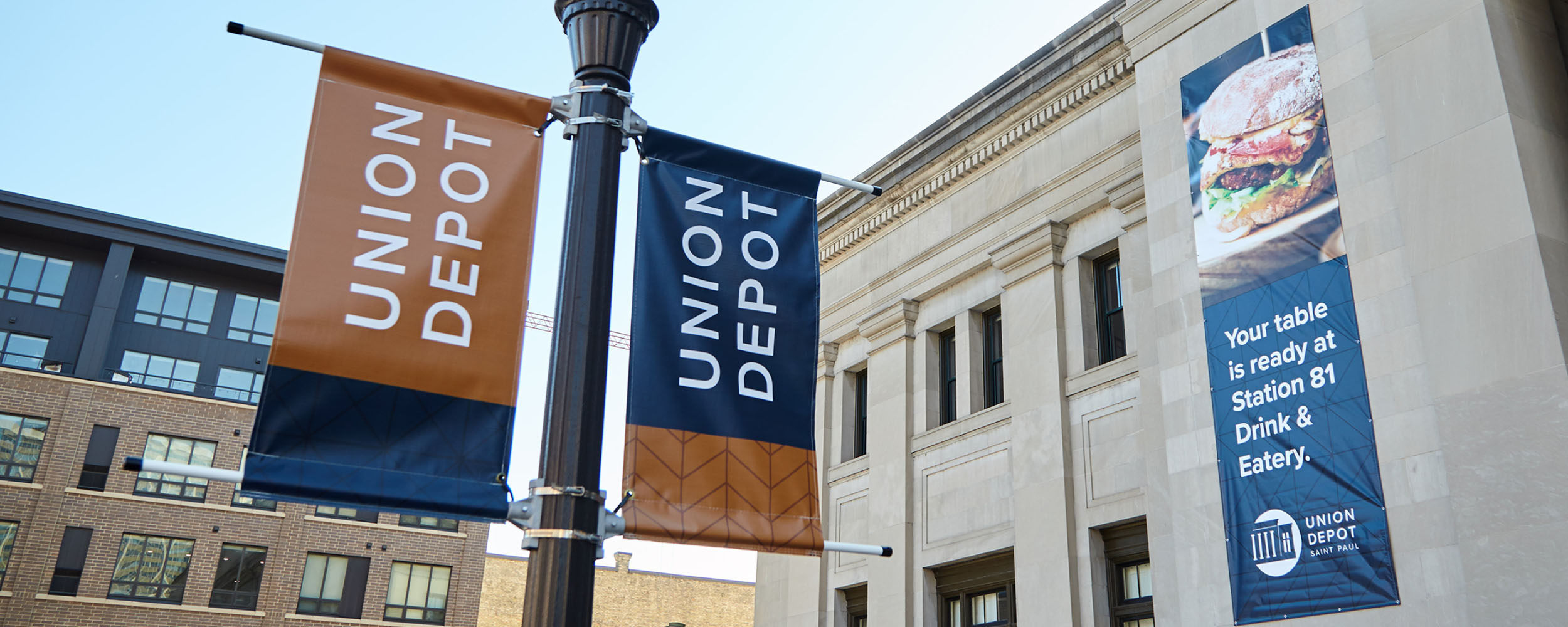 Light pole displaying Union Depot signage outside venue in Saint Paul Minnesota