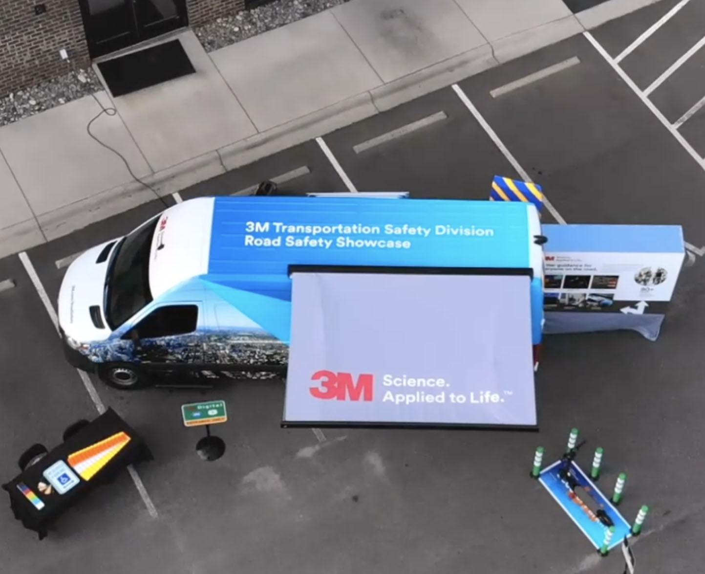 aerial image of 3M road safety campaign van with advertising awning